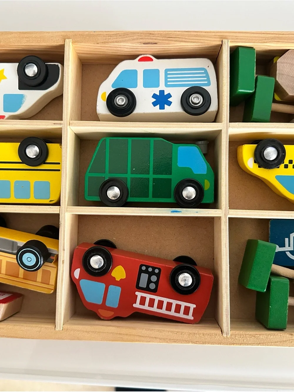 Melissa & Doug Wooden Vehicle Set in Red, Green, Yellow, White, Blue